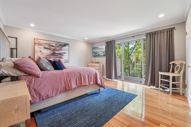 bedroom with wood finished floors, access to exterior, crown molding, and recessed lighting