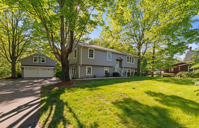 26 Maple Ave, North Haven, CT 06473 - split foyer home with a detached garage and a front yard