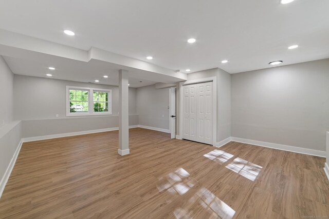 26 Maple Ave, North Haven, CT 06473 - basement featuring baseboards, light wood finished floors, and recessed lighting