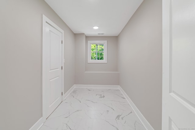 26 Maple Ave, North Haven, CT 06473 - hallway with light marble finish floors and baseboards