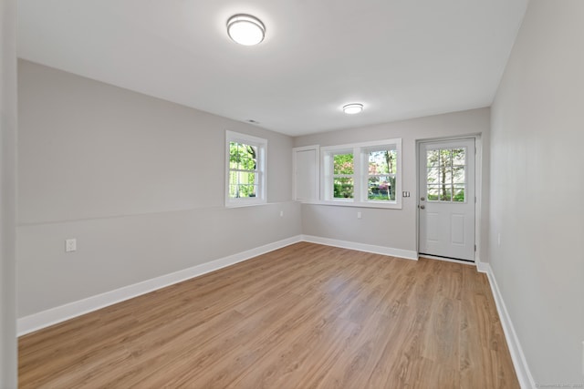 26 Maple Ave, North Haven, CT 06473 - unfurnished room with baseboards and light wood-style floors