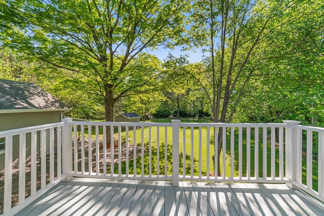 26 Maple Ave, North Haven, CT 06473 - wooden terrace with a shed, an outbuilding, a lawn, and view of scattered trees