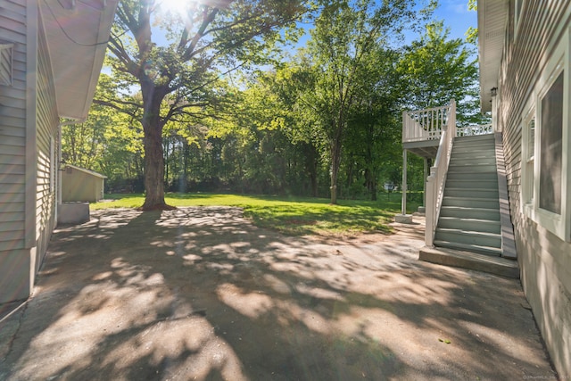 26 Maple Ave, North Haven, CT 06473 - view of grassy yard featuring stairs, a patio, and a wooden deck