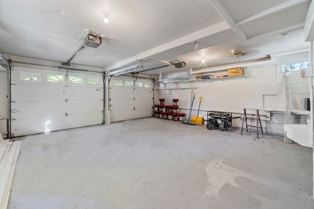 26 Maple Ave, North Haven, CT 06473 - garage featuring a garage door opener