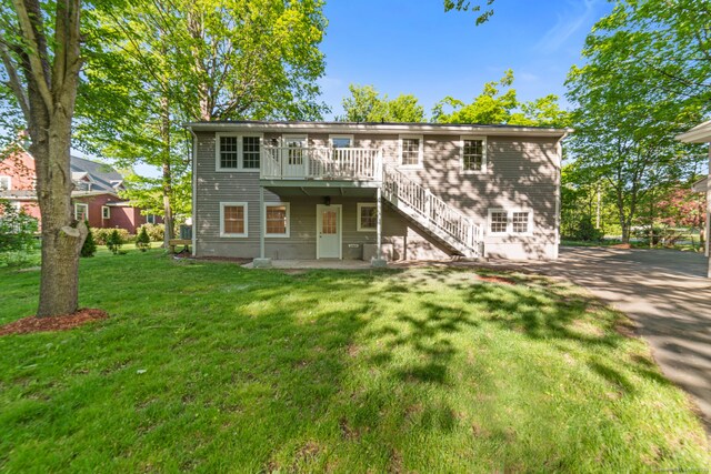 26 Maple Ave, North Haven, CT 06473 - back of house featuring stairway, a wooden deck, and a yard