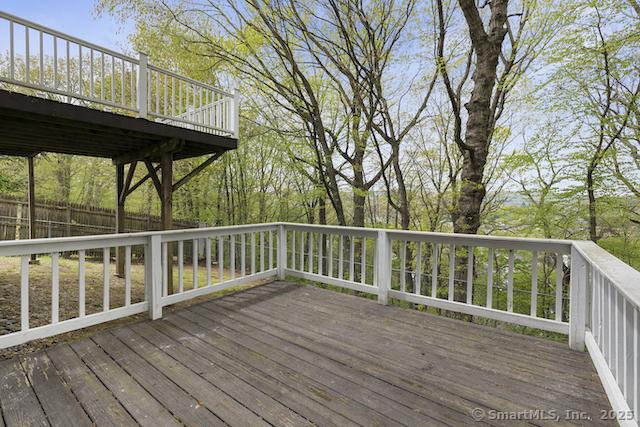 wooden deck featuring fence