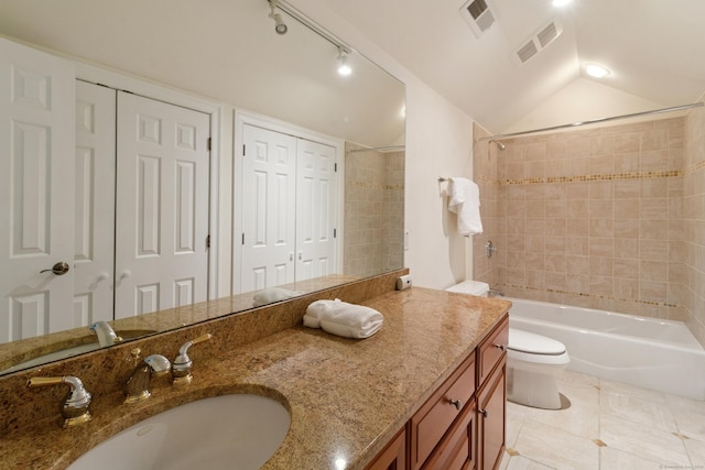 65 Church Rd, Sherman, CT 06784 - bathroom featuring toilet, vanity, tub / shower combination, lofted ceiling, and tile patterned flooring