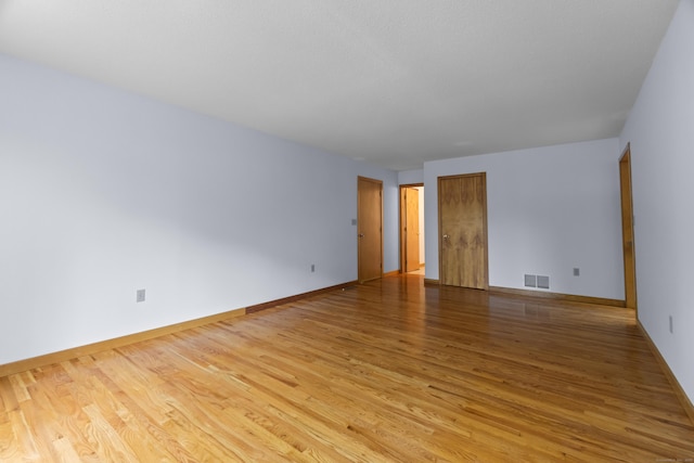 2 Meadowview Ln, Norwich, CT 06360 - empty room with light wood finished floors and baseboards