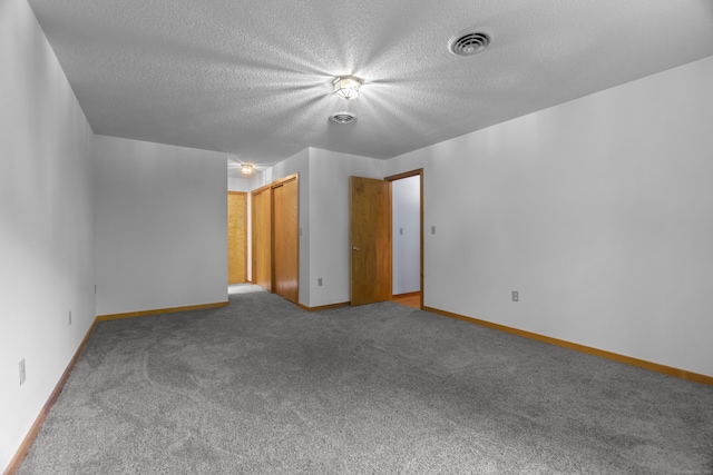 2 Meadowview Ln, Norwich, CT 06360 - carpeted spare room with a textured ceiling and baseboards