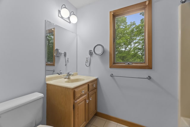 2 Meadowview Ln, Norwich, CT 06360 - bathroom featuring vanity, toilet, tile patterned flooring, and baseboards
