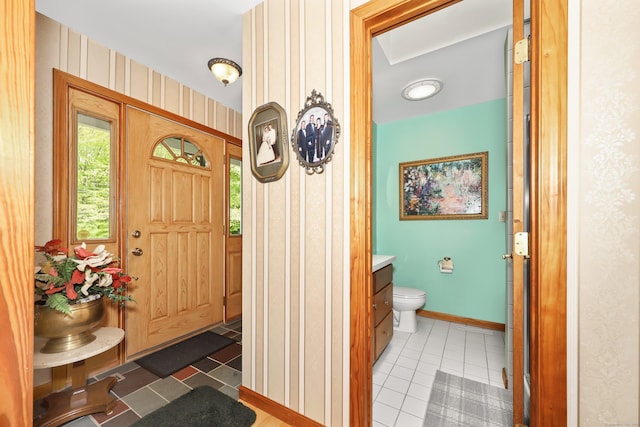 17A Morris Rd, Prospect, CT 06712 - entryway with tile patterned flooring, wallpapered walls, and baseboards