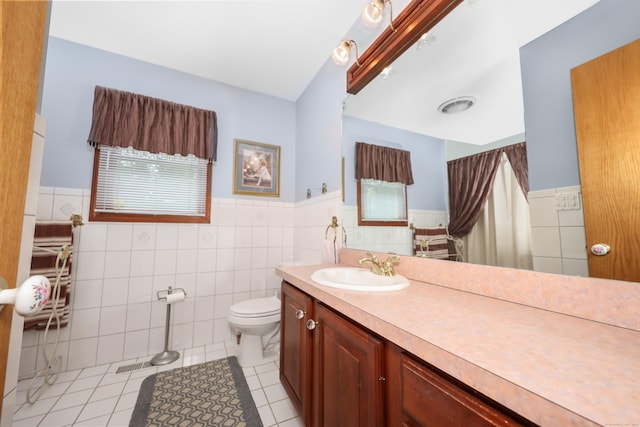 17A Morris Rd, Prospect, CT 06712 - bathroom featuring tile walls, tile patterned flooring, toilet, wainscoting, and vanity