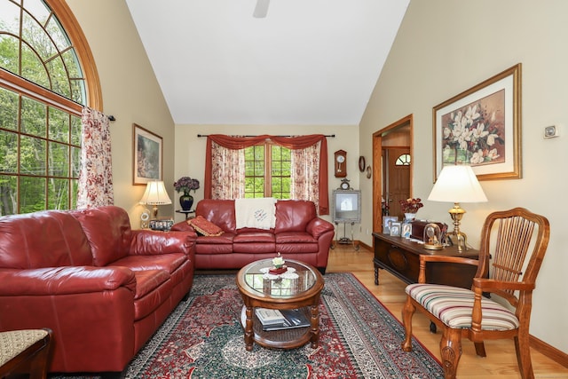 17A Morris Rd, Prospect, CT 06712 - living area with high vaulted ceiling, wood finished floors, and a ceiling fan