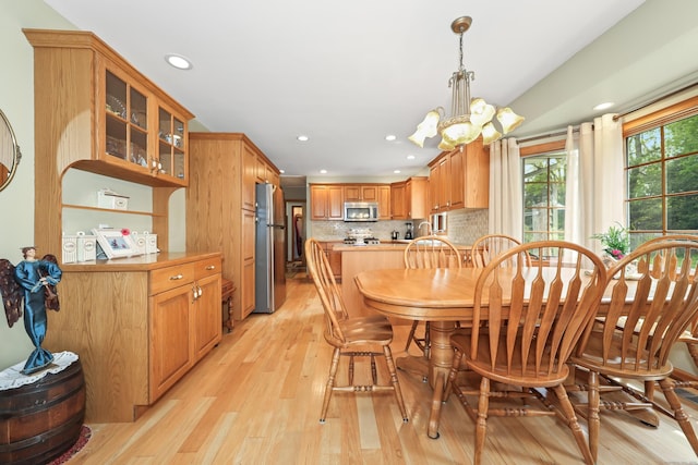 17A Morris Rd, Prospect, CT 06712 - dining area with light wood finished floors, a chandelier, and recessed lighting