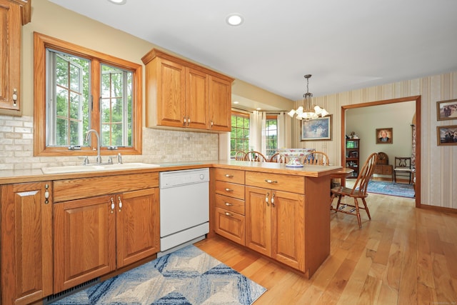 17A Morris Rd, Prospect, CT 06712 - kitchen featuring dishwasher, a peninsula, a sink, a chandelier, and light countertops