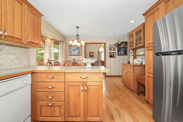 17A Morris Rd, Prospect, CT 06712 - kitchen featuring freestanding refrigerator, dishwasher, a peninsula, light wood-type flooring, and plenty of natural light