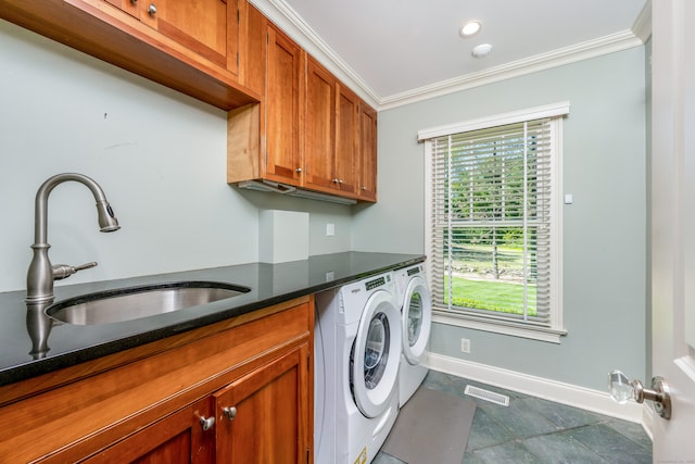 21 Park Pl, Darien, CT 06820 - washroom featuring washer and clothes dryer, baseboards, cabinet space, and ornamental molding