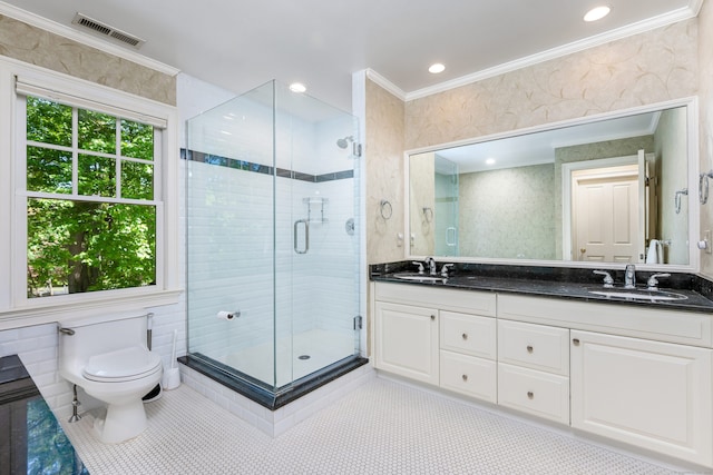 21 Park Pl, Darien, CT 06820 - full bath with double vanity, a stall shower, ornamental molding, toilet, and tile patterned flooring