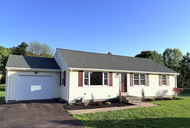 244 Spruce Brook Rd, Berlin, CT 06037 - view of front of property with an attached garage, driveway, a front yard, a chimney, and a shingled roof
