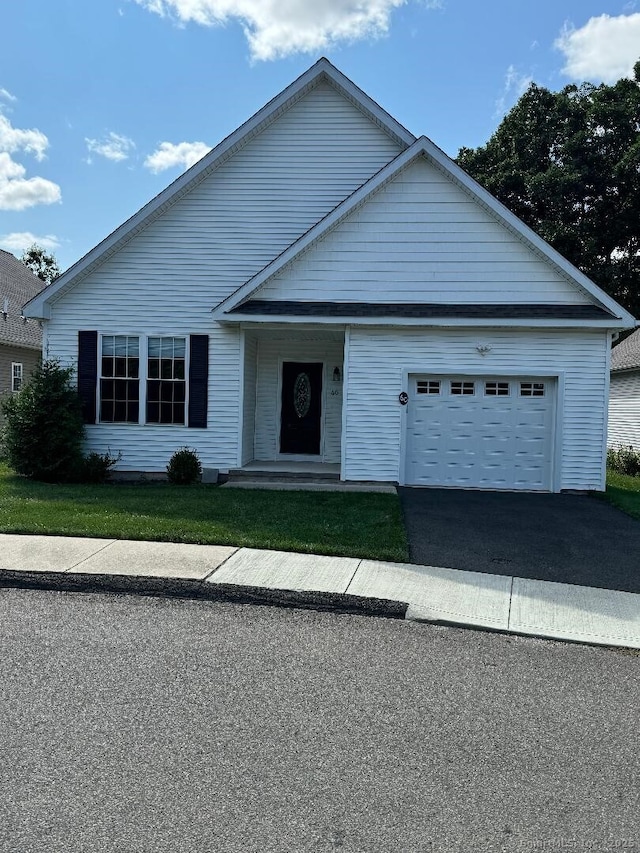 60 Pinehurst Dr Unit 60, East Haven, CT 06513 - view of front of home featuring an attached garage and driveway
