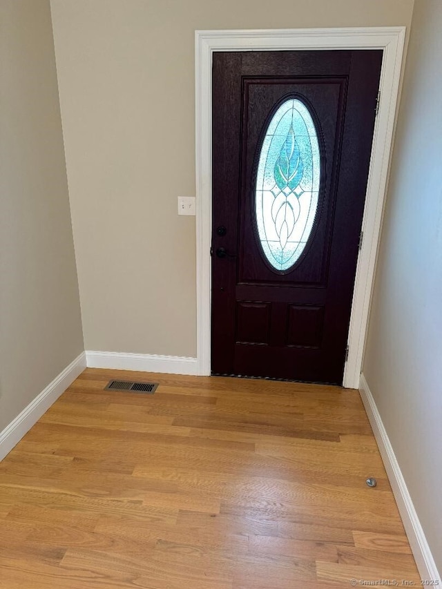 60 Pinehurst Dr Unit 60, East Haven, CT 06513 - foyer with baseboards and light wood-type flooring