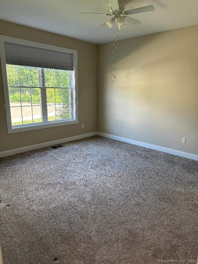 60 Pinehurst Dr Unit 60, East Haven, CT 06513 - empty room featuring baseboards, carpet floors, and a ceiling fan