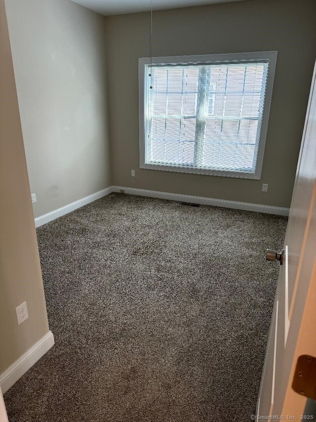 60 Pinehurst Dr Unit 60, East Haven, CT 06513 - carpeted empty room with baseboards
