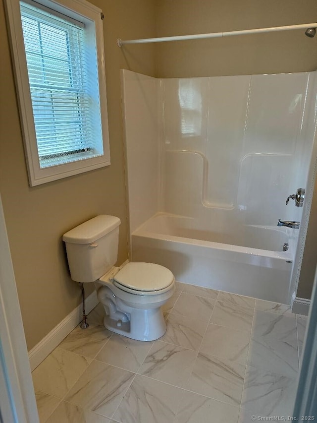60 Pinehurst Dr Unit 60, East Haven, CT 06513 - bathroom featuring baseboards, toilet, bathtub / shower combination, and marble look tiles