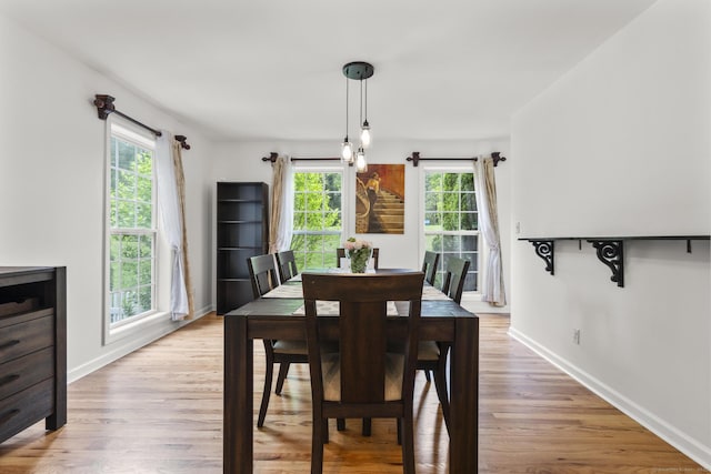 40 High Ridge Rd, Hamden, CT 06514 - dining area featuring light wood-style flooring and baseboards