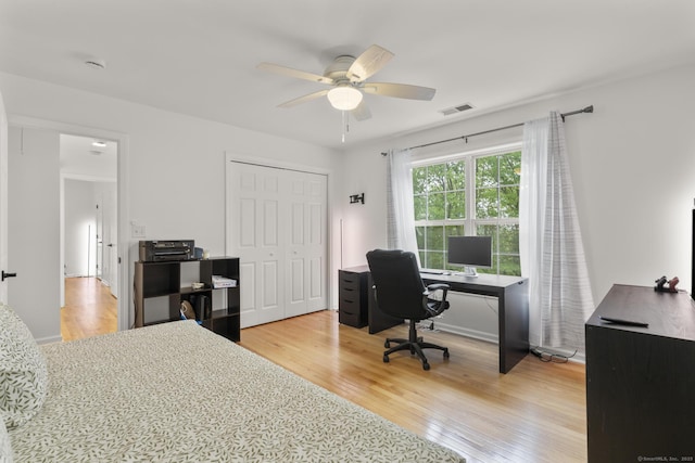 40 High Ridge Rd, Hamden, CT 06514 - bedroom with a desk, light wood-type flooring, and a closet