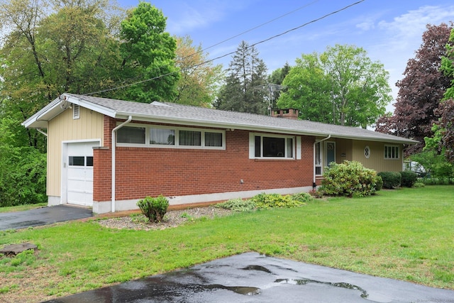 16 Ellsworth Rd, East Windsor, CT 06016 - single story home with brick siding, a front yard, asphalt driveway, a garage, and a chimney