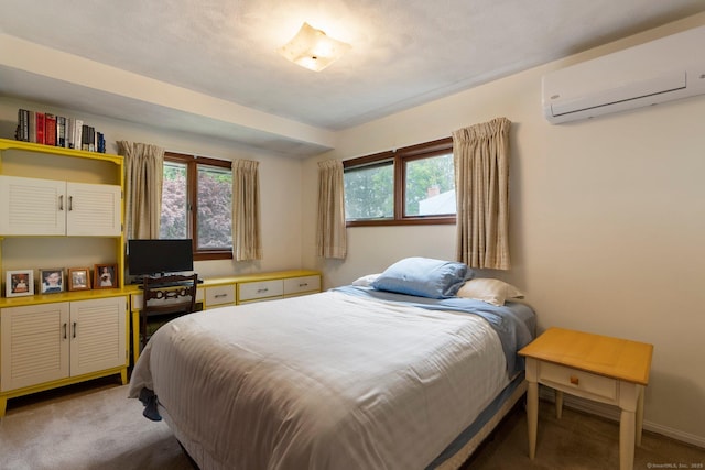16 Ellsworth Rd, East Windsor, CT 06016 - bedroom with a wall unit AC, light carpet, and multiple windows