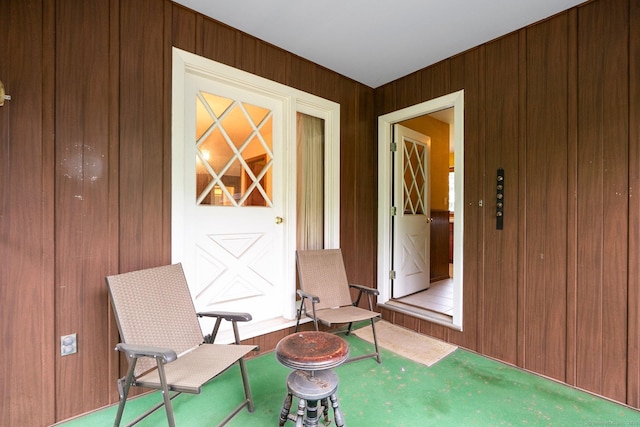 16 Ellsworth Rd, East Windsor, CT 06016 - living area featuring carpet and wood walls