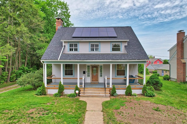 30 Birchwood St, Waterbury, CT 06708 - view of front of property featuring a front yard, a porch, solar panels, a chimney, and a shingled roof