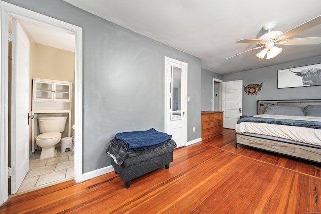 30 Birchwood St, Waterbury, CT 06708 - bedroom featuring hardwood / wood-style flooring, ensuite bathroom, and baseboards