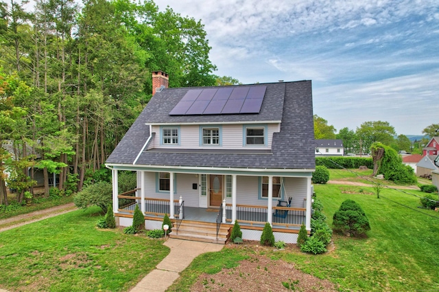 30 Birchwood St, Waterbury, CT 06708 - view of front facade featuring a porch, a front yard, roof mounted solar panels, a chimney, and roof with shingles