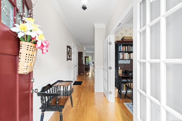 20 Webster Ln Unit 20, Middletown, CT 06457 - hall with french doors, crown molding, wood finished floors, wainscoting, and wallpapered walls
