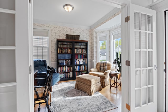 20 Webster Ln Unit 20, Middletown, CT 06457 - sitting room featuring wallpapered walls, ornamental molding, wood finished floors, and a wainscoted wall