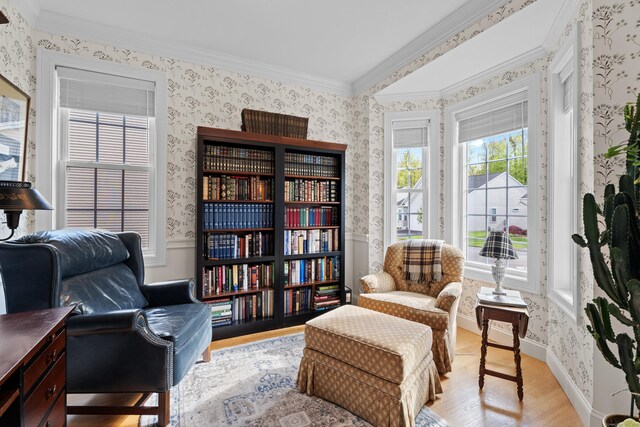 20 Webster Ln Unit 20, Middletown, CT 06457 - living area featuring wallpapered walls, light wood-style floors, crown molding, and baseboards