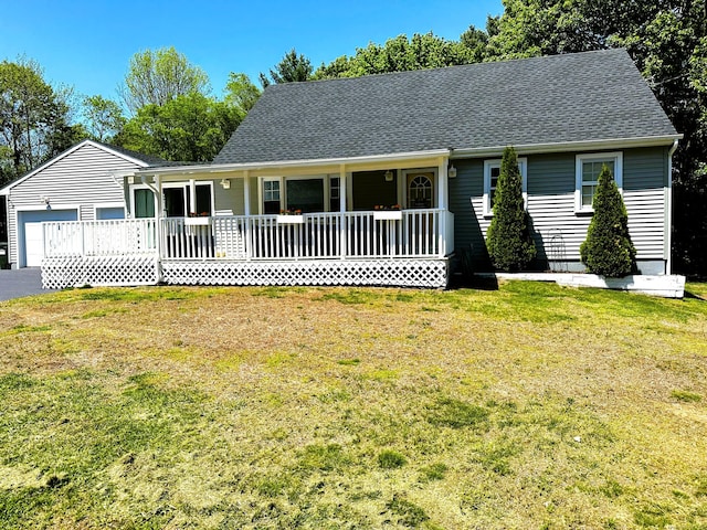 17 Aspen Ct, Norwich, CT 06360 - view of front facade with a porch, a front lawn, a garage, and roof with shingles