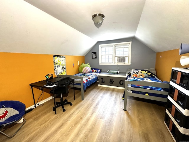 17 Aspen Ct, Norwich, CT 06360 - bedroom with wood finished floors, cooling unit, lofted ceiling, and baseboards