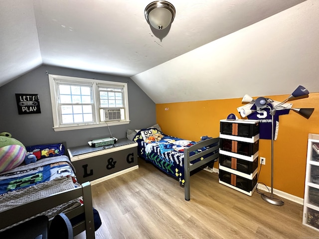 17 Aspen Ct, Norwich, CT 06360 - bedroom featuring wood finished floors, lofted ceiling, baseboards, and cooling unit