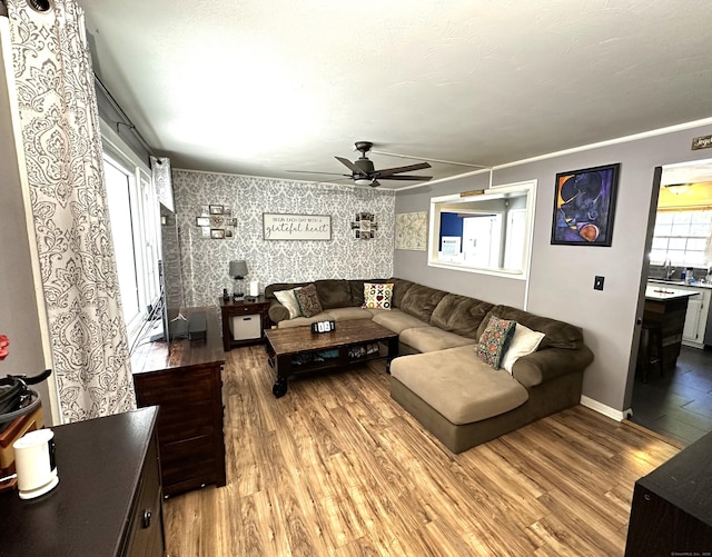 17 Aspen Ct, Norwich, CT 06360 - living room featuring a ceiling fan, wood finished floors, and baseboards