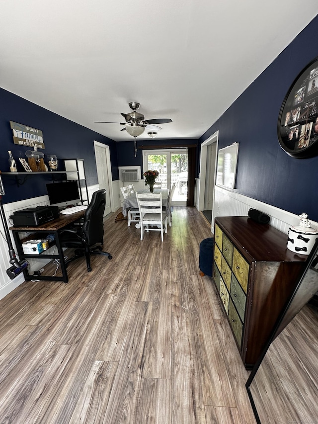 17 Aspen Ct, Norwich, CT 06360 - home office featuring wood finished floors, a ceiling fan, and wainscoting