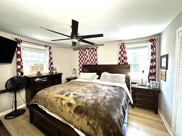 17 Aspen Ct, Norwich, CT 06360 - bedroom with baseboards, light wood-style flooring, a ceiling fan, and cooling unit