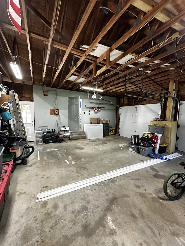 17 Aspen Ct, Norwich, CT 06360 - garage with a garage door opener
