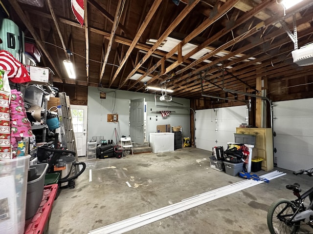 17 Aspen Ct, Norwich, CT 06360 - garage with a garage door opener