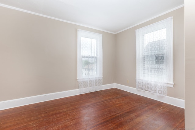 650 Broadview Ter, Hartford, CT 06106 - spare room featuring ornamental molding, dark wood-type flooring, and baseboards