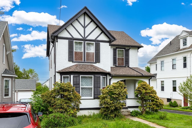 650 Broadview Ter, Hartford, CT 06106 - view of front facade featuring stucco siding, a porch, and a shingled roof