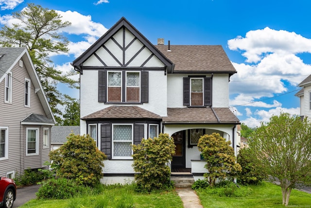 650 Broadview Ter, Hartford, CT 06106 - view of front of property featuring stucco siding, a shingled roof, a chimney, and a porch